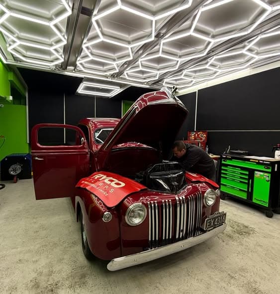 Tuner working on a classic Ford at The Torque Lab workshop